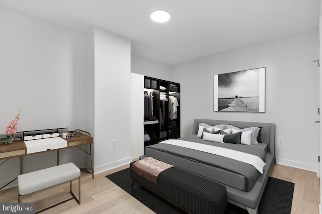 bedroom featuring light hardwood / wood-style floors