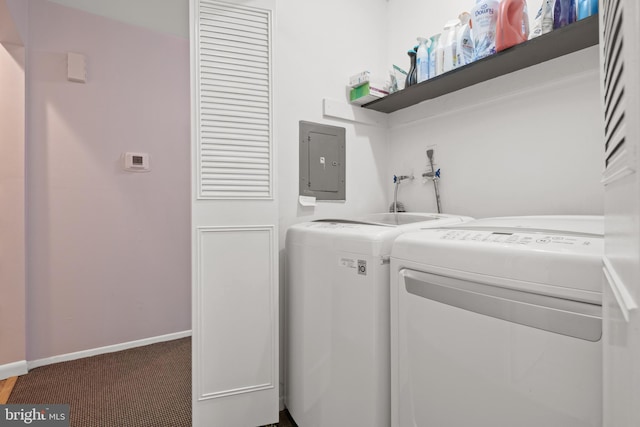 clothes washing area with laundry area, carpet floors, baseboards, electric panel, and washing machine and clothes dryer