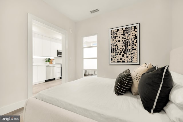 bedroom featuring light hardwood / wood-style floors