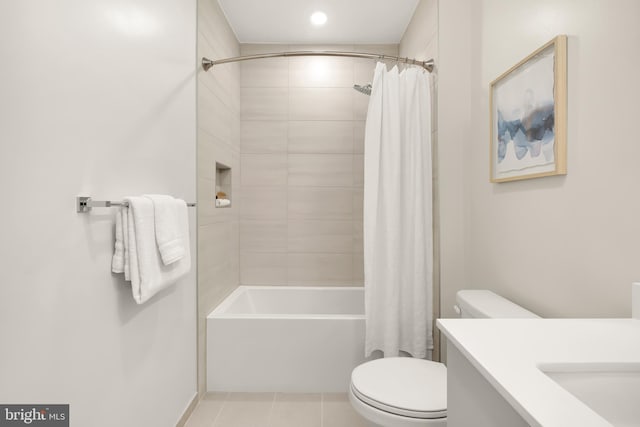 full bathroom with toilet, shower / bath combo, tile patterned flooring, and vanity