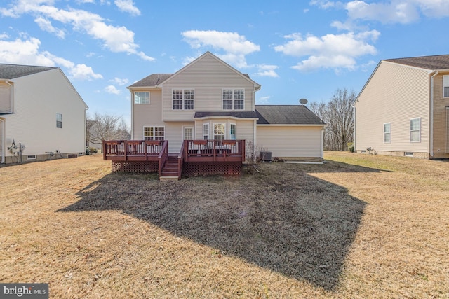 back of property with cooling unit, a yard, and a wooden deck