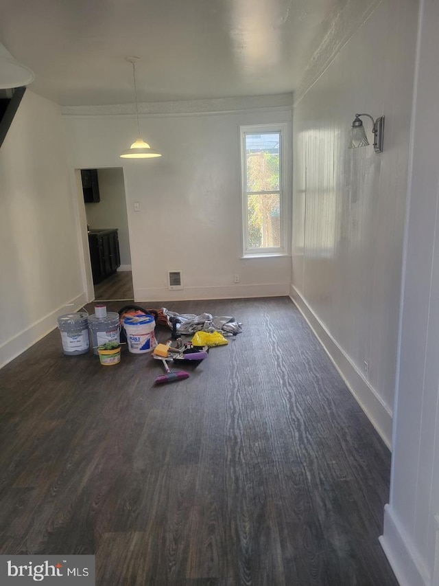 interior space with dark hardwood / wood-style floors