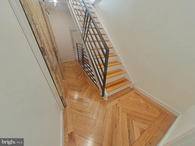 staircase with baseboards