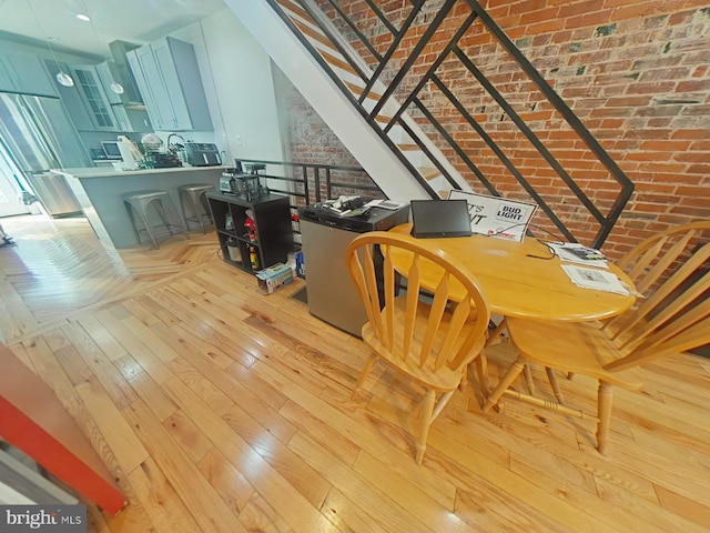 dining room featuring light wood-type flooring