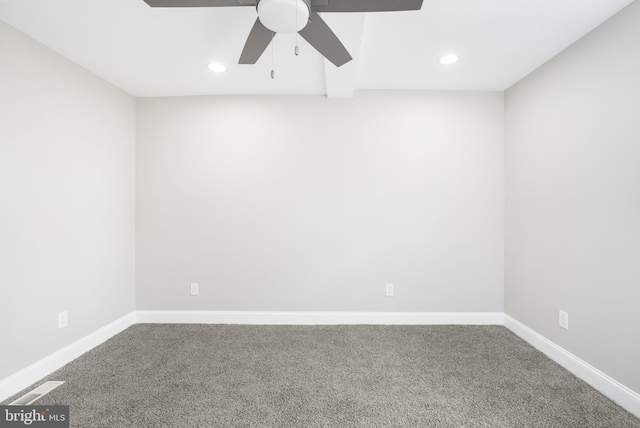 carpeted empty room featuring visible vents, baseboards, a ceiling fan, and recessed lighting