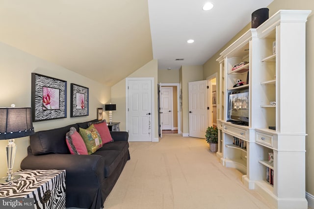 living room featuring light colored carpet, visible vents, baseboards, and recessed lighting