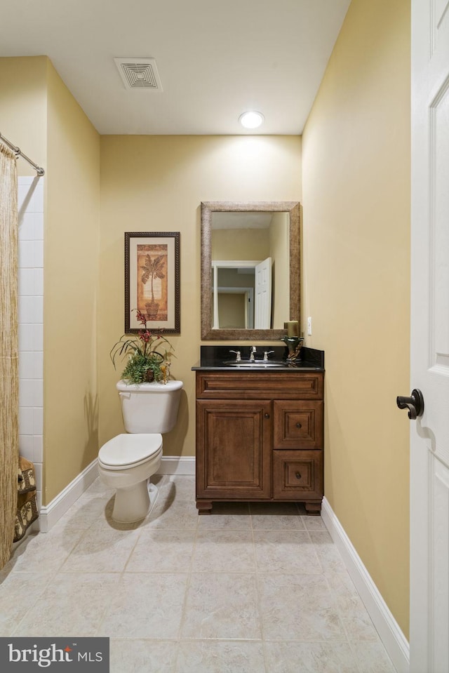 bathroom featuring baseboards, visible vents, toilet, curtained shower, and vanity