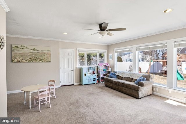 carpeted living room with baseboards, crown molding, and recessed lighting