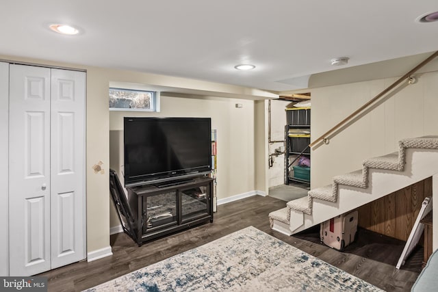 living area featuring stairs, dark wood-type flooring, recessed lighting, and baseboards