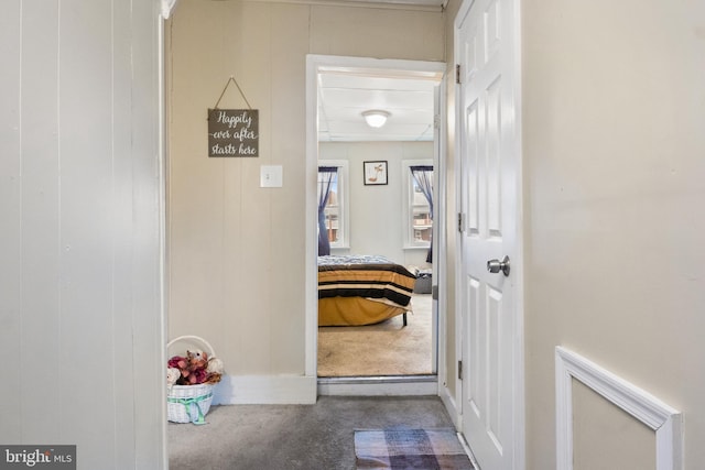 corridor featuring carpet floors