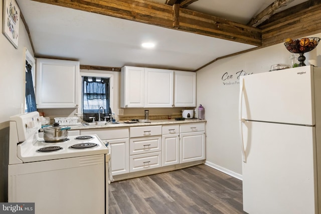 kitchen with white appliances, white cabinetry, light countertops, and a sink