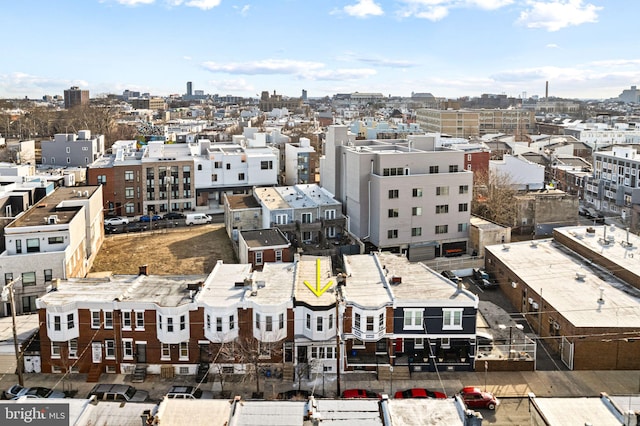 birds eye view of property featuring a view of city