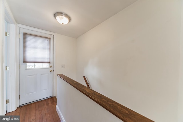 doorway with hardwood / wood-style floors