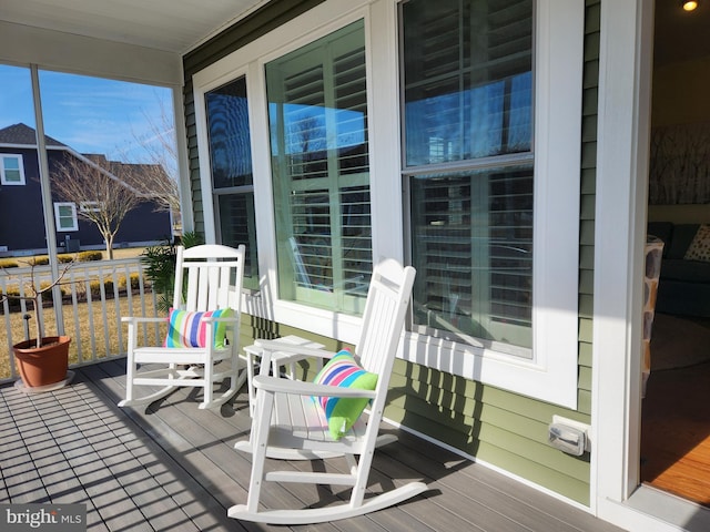 deck featuring covered porch