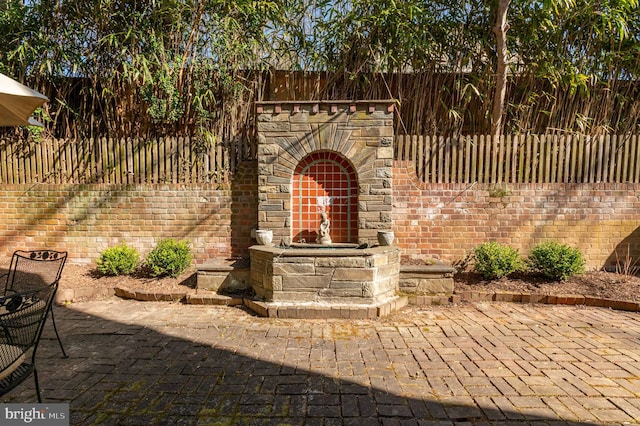 view of patio / terrace with fence