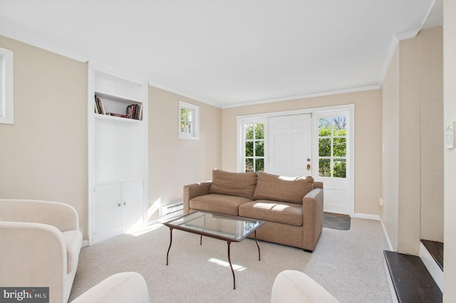 living area featuring crown molding, plenty of natural light, carpet, and a baseboard radiator