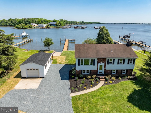 drone / aerial view featuring a water view