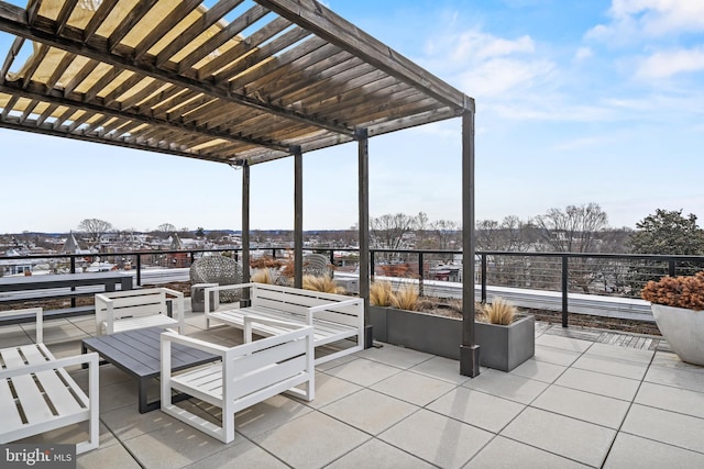 view of patio featuring an outdoor living space and a pergola