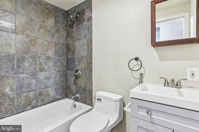 full bathroom featuring toilet, tub / shower combination, and vanity