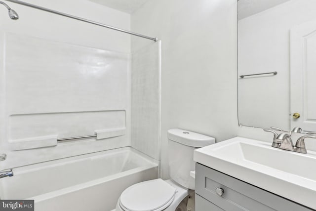 full bathroom featuring toilet, shower / bathtub combination, and vanity