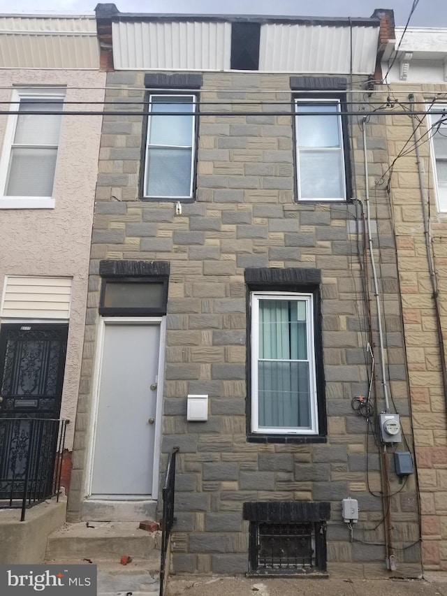 view of front of house featuring stone siding