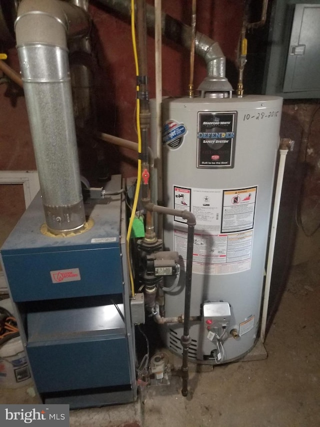 utility room with gas water heater