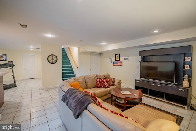 living room with visible vents, recessed lighting, light tile patterned flooring, baseboards, and stairs