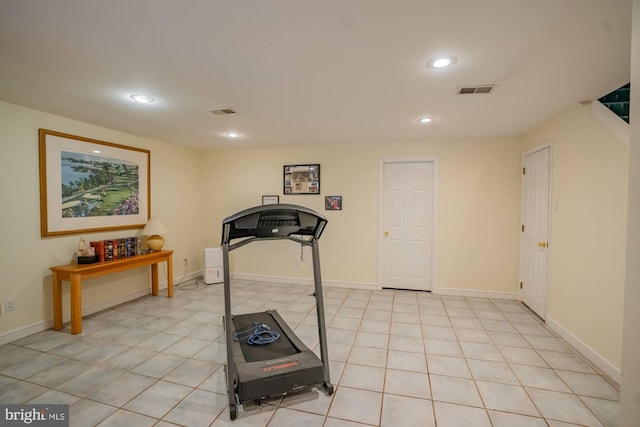 exercise area with visible vents, recessed lighting, and baseboards