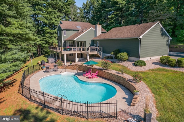 view of swimming pool with stairway, a fenced in pool, fence, a deck, and a patio area