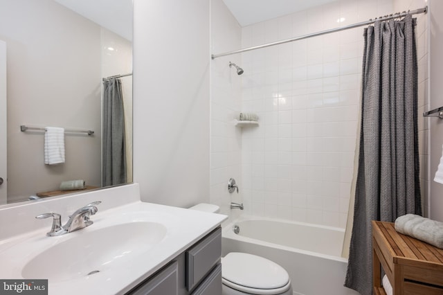 bathroom with toilet, vanity, and shower / tub combo with curtain