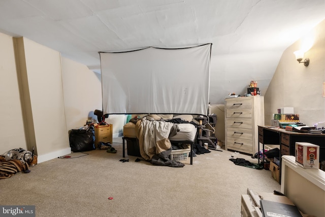 bedroom featuring light carpet