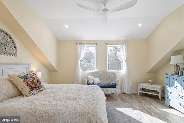 bedroom with light wood finished floors, lofted ceiling, recessed lighting, a ceiling fan, and baseboards