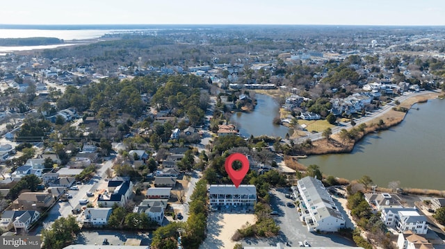 aerial view featuring a water view and a residential view