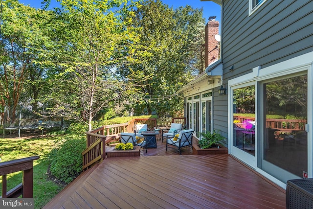 deck with a trampoline