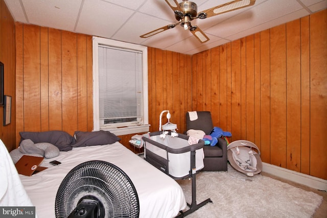 15 N 10th St, Lebanon, PA 17046 - bedroom featuring a ceiling fan and wooden walls