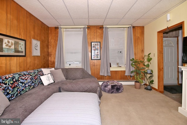 15 N 10th St, Lebanon, PA 17046 - carpeted living area featuring wooden walls and baseboard heating