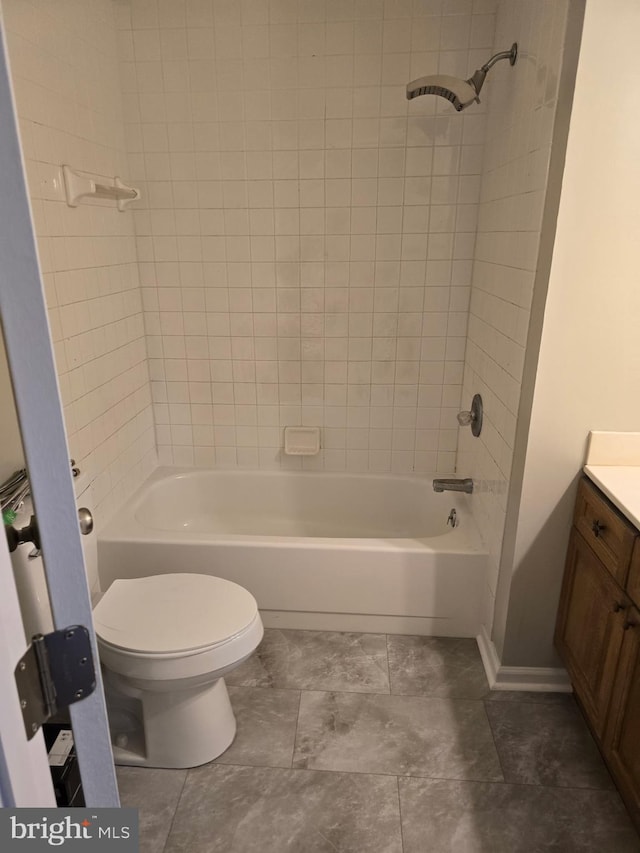 full bathroom featuring bathtub / shower combination, vanity, and toilet