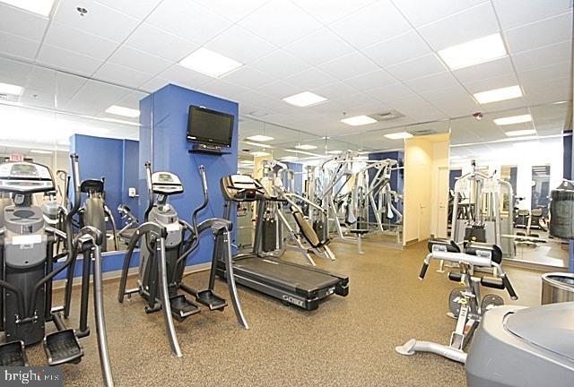 gym with a drop ceiling