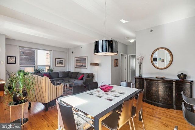 dining room with light wood-style flooring