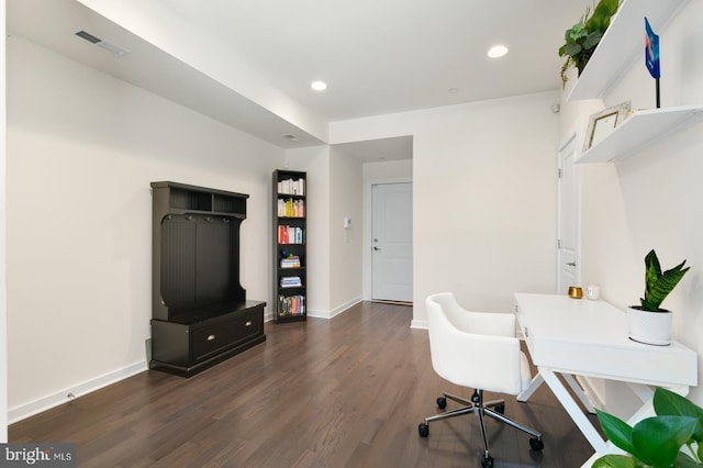 office space featuring recessed lighting, wood finished floors, visible vents, and baseboards