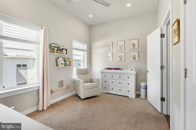 living area with carpet flooring, recessed lighting, baseboards, and a ceiling fan