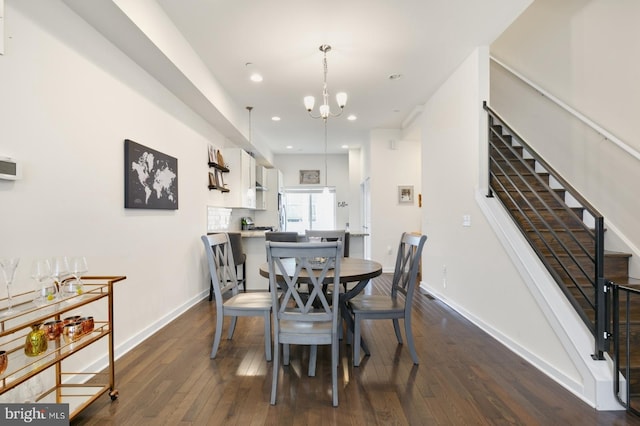 dining space featuring stairs, baseboards, and dark wood-style flooring