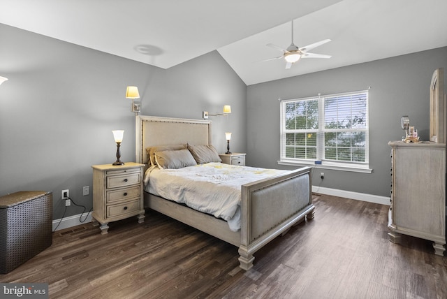 bedroom with dark wood-style floors, vaulted ceiling, a ceiling fan, and baseboards