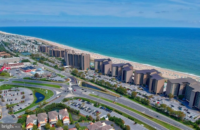 aerial view with a beach view and a water view