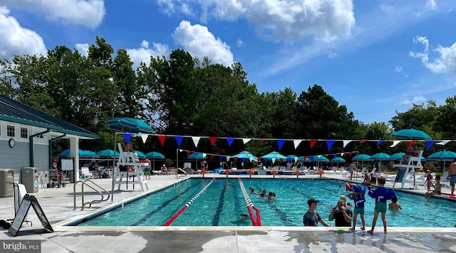 view of swimming pool featuring a patio