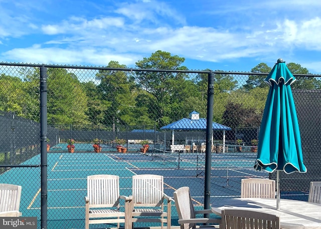 view of sport court featuring a gazebo