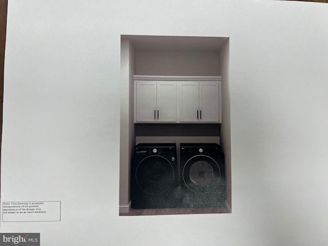 room details featuring washing machine and clothes dryer