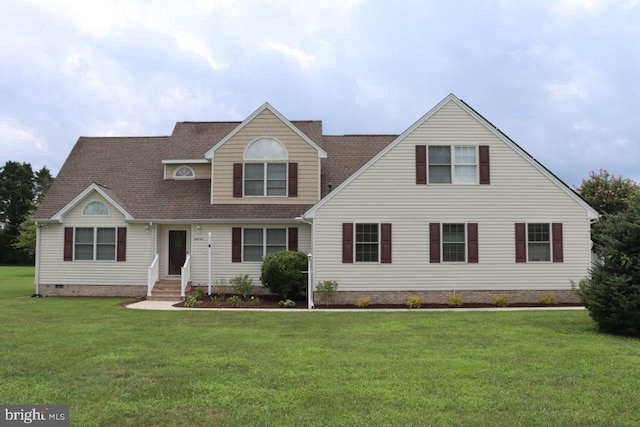 view of front of property with crawl space, a front lawn, and roof with shingles