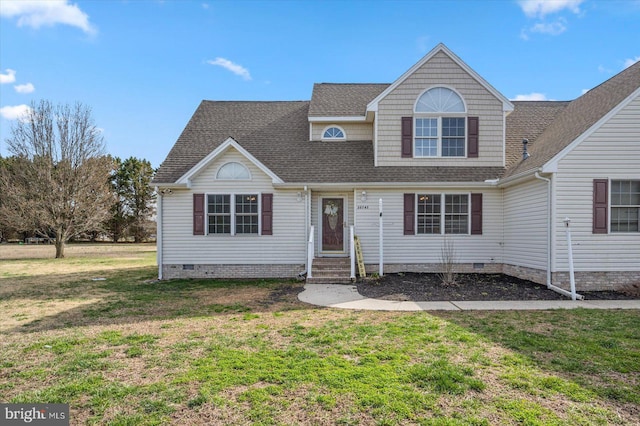 view of front of home featuring crawl space, roof with shingles, a front yard, and entry steps