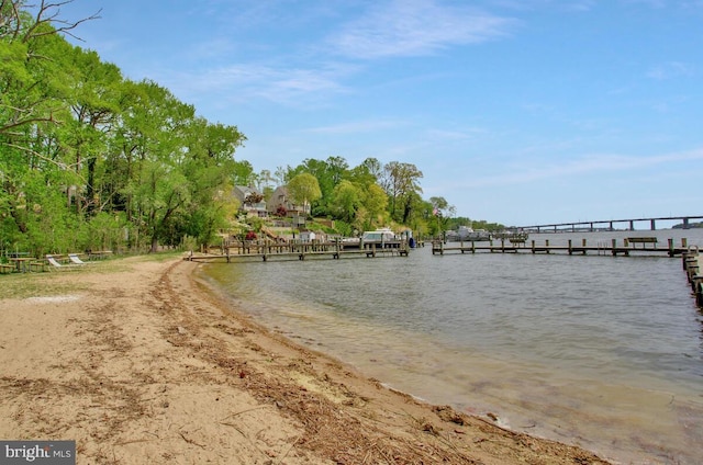 view of water feature with a boat dock
